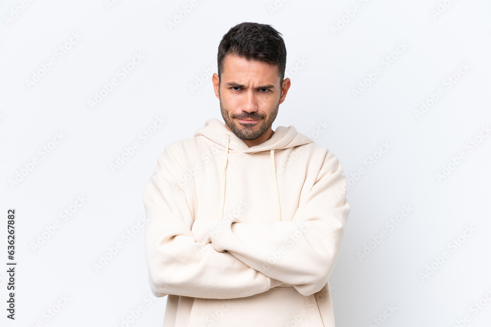 Young caucasian man isolated on white background with unhappy expression Young caucasian man isolated on white background with unhappy expression