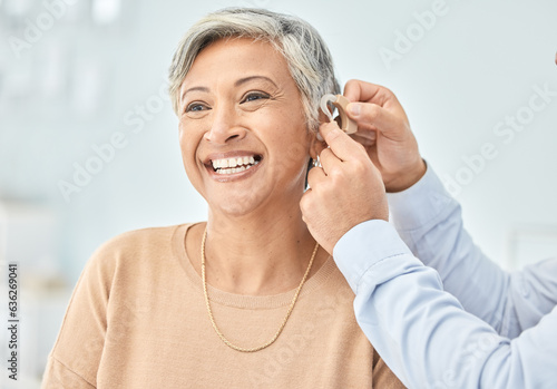 Senior patient, hearing aid and doctor hands, ear and listening, help and trust, healthcare and medicine. Medical tech, consultation with ENT specialist and health, happy woman and people at clinic