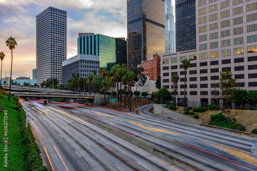 Dawning Urban Energy: 4K Image of Los Angeles Downtown and Morning Traffic at Sunrise