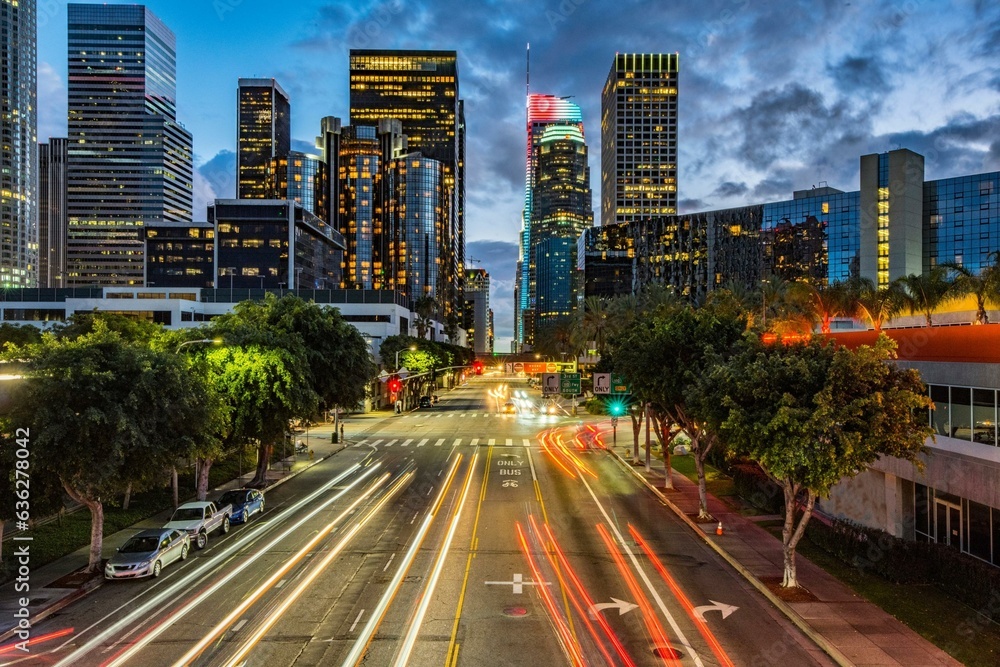 City Lights Aglow: 4K Image of Evening Traffic Flow on Road in Downtown Los Angeles