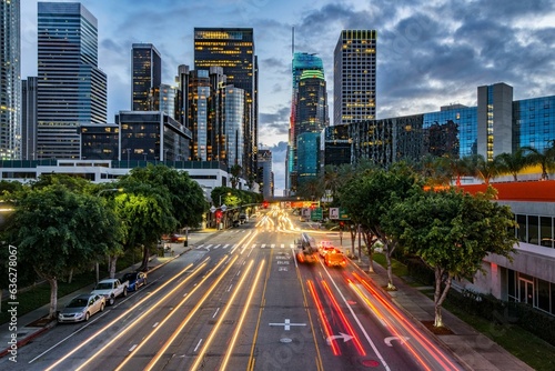 City Lights Aglow: 4K Image of Evening Traffic Flow on Road in Downtown Los Angeles