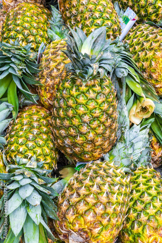 Photography pineapples close up for sale at a street market shot on toronto's spadina avenue