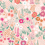 Beautiful floral pattern in small abstract flowers. Small colorful flowers. Pink background. Ditsy print. Floral seamless background. 