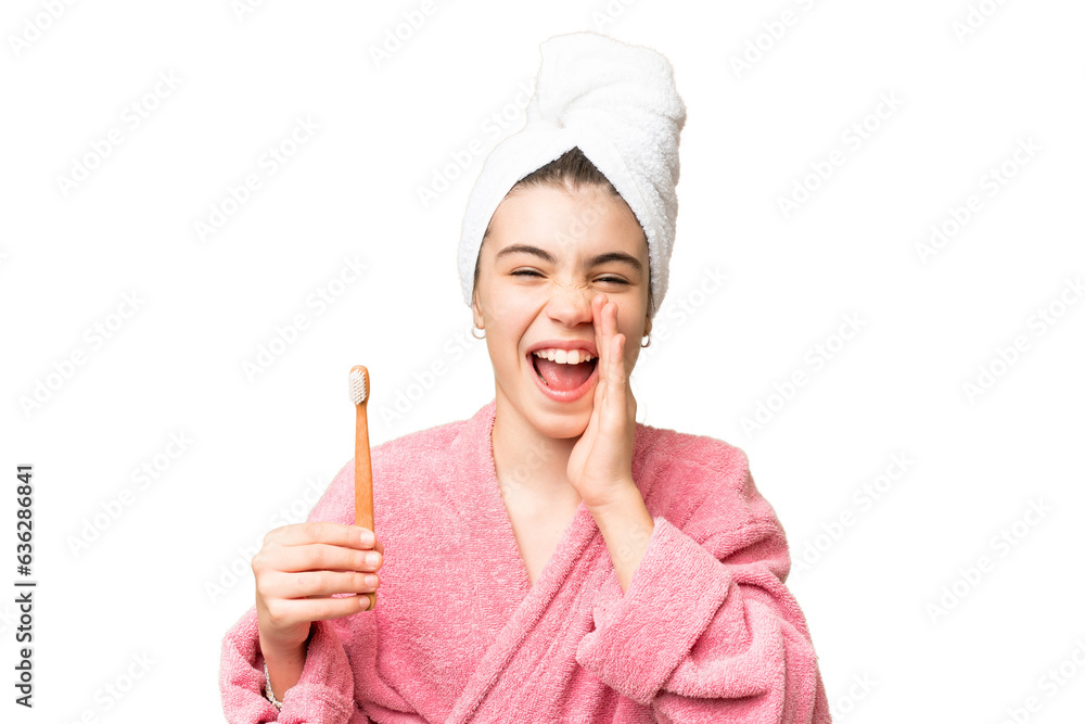 Little girl brushing teeth over isolated chroma key background shouting with mouth wide open Little girl brushing teeth over isolated chroma key background shouting with mouth wide open