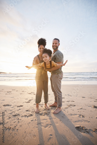 Parents  girl child and beach with airplane game  smile or portrait for bonding  love or sunset on holiday. Father  mother and daughter for plane  play or interracial family on vacation  waves or sea