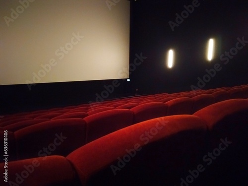 Canvastavla Empty movie theather with empty seats and blank screen