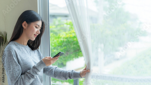 Lifestyle beautiful beauty woman Asian cute girl feel happy using smartphone in bedroom at home Free Download Lifestyle beautiful beauty woman Asian cute girl feel happy using smartphone in bedroom at home - GFXLoad