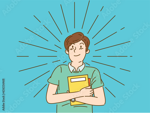 Young man holding a book