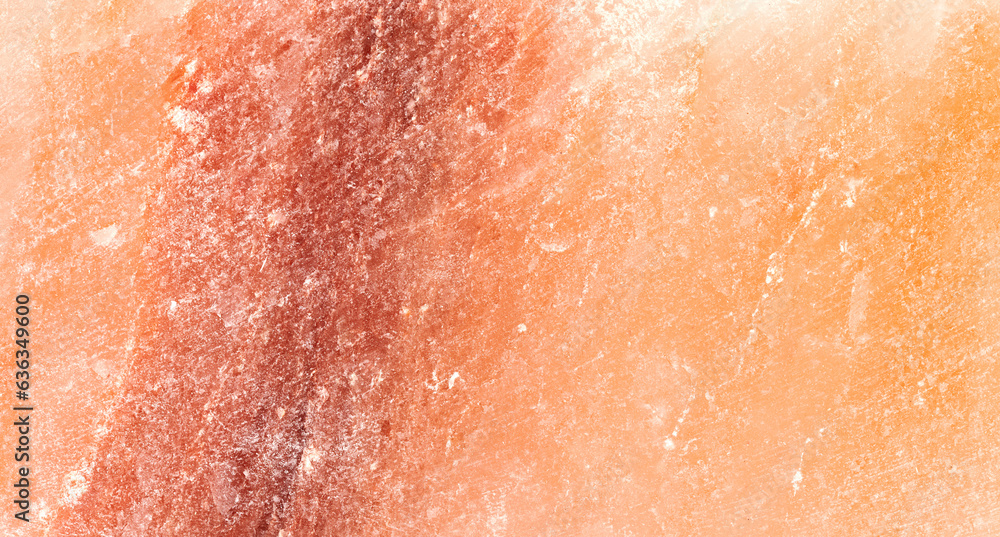 Himalayan salt stone closeup background, texture of natural pink salt crystal