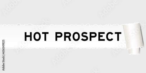 Ripped gray paper background that have word hot prospect under torn part