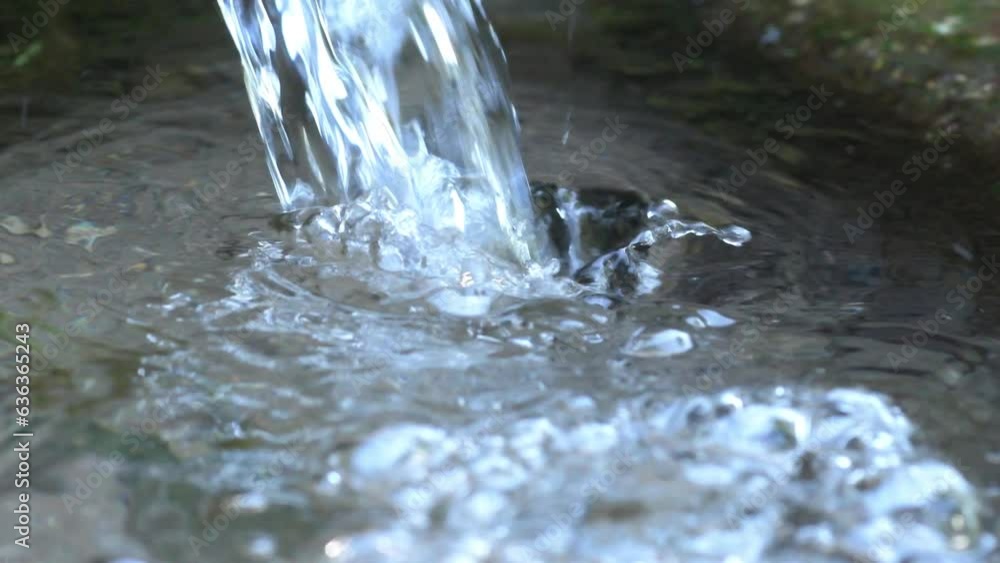 beautiful natural ecologic spring water stream. 4k macro footage beautiful natural ecologic spring water stream. 4k macro footage