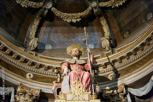 polychrome sculpture of the baroque altar with the image of Saint James the Greater on his throne dressed as a pilgrim heading to Santiago de Compostela