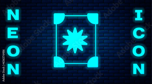 Glowing neon Ancient magic book with alchemy recipes and mystic spells and enchantments icon isolated on brick wall background. Vector