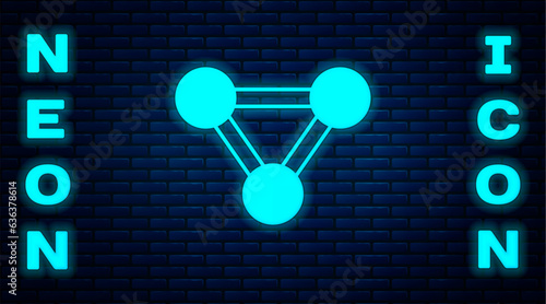 Glowing neon Molecule icon isolated on brick wall background. Structure of molecules in chemistry, science teachers innovative educational poster. Vector