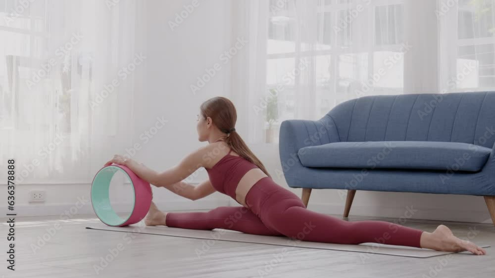 group of women gathered together to study yoga in a class. group of women gathered together to study yoga in a class.