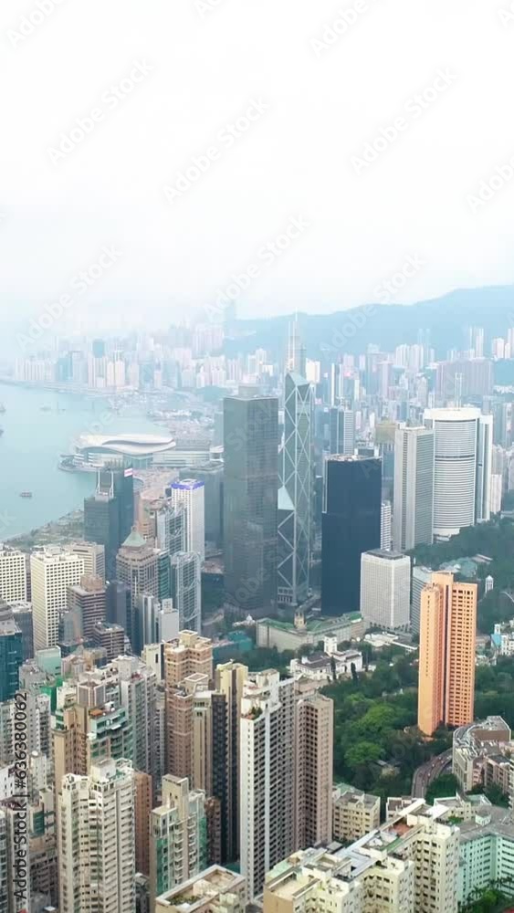 Hong Kong Skyline. Hong Kong Residential Buildings. Modern buildings in Hong Kong. Aerial vertical, vertical video background. Hong Kong Skyline. Hong Kong Residential Buildings. Modern buildings in Hong Kong. Aerial vertical, vertical video background.