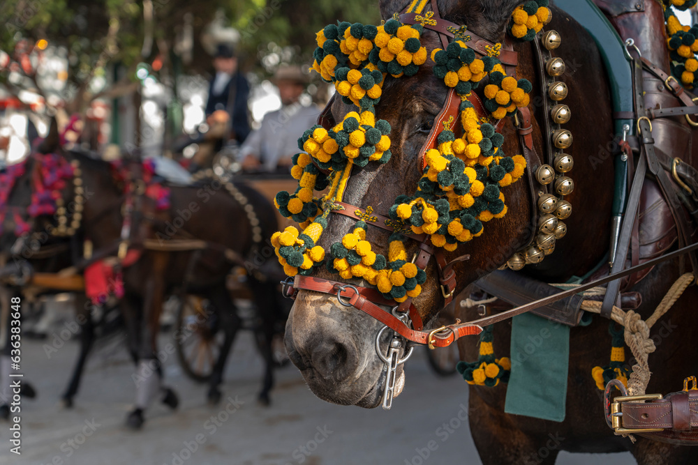 Horses parade amidst the flamenco rhythms of the Malaga Fair. Andalusia's summer celebration shines with tradition, culture, and vibrant festivities captivating tourists and locals alike.