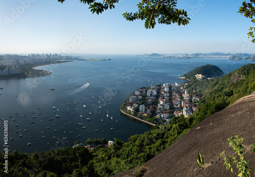 Rio de Janeiro, Brazil: the skyline of Rio on the left, with Urca district below, and  the municipality of Niteroi on the right seen from Morro da Urca (Urca Mountain), first station of th photo