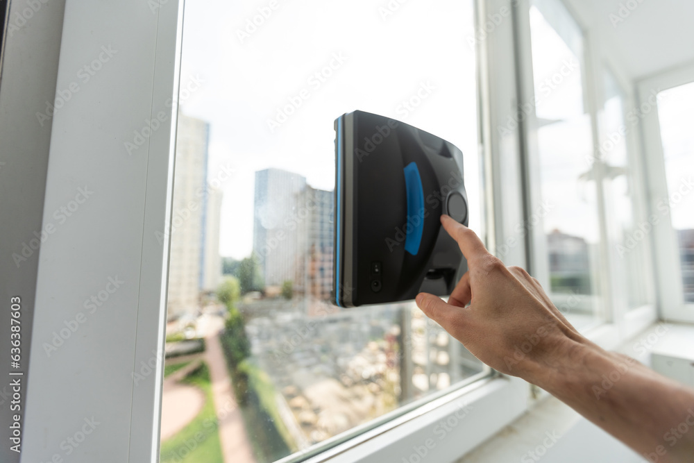 The white robotic window cleaner uses a brush and vacuum for a thorough cleaning. The automatic window washer is a great help for housekeeping tasks. The white robotic window cleaner uses a brush and vacuum for a thorough cleaning. The automatic window washer is a great help for housekeeping tasks.