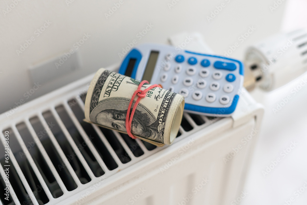 closeup dollar bills inside a white radiator