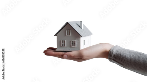 Hand holding model house for buy real estate concept. photo