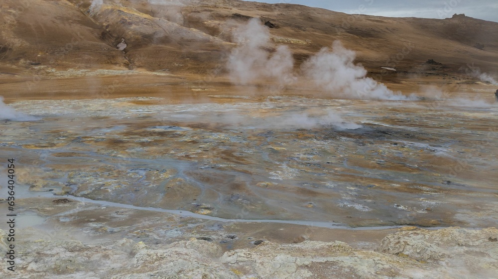 Sulfur-hot geysers at Hverir in Iceland in a natural outdoor setting Sulfur-hot geysers at Hverir in Iceland in a natural outdoor setting