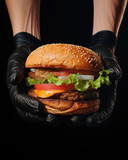 Generated photorealistic image of a burger in black gloved hands