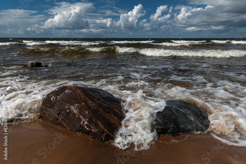 Scenic view of the Baltic Sea coastline near Lauci Stone in Latvia. photo