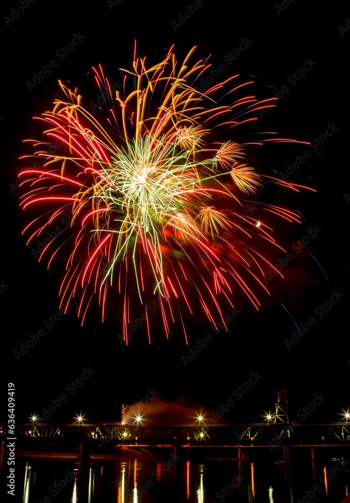Vibrant festive fireworks over the Meridian Highway Bridge at night Vibrant festive fireworks over the Meridian Highway Bridge at night