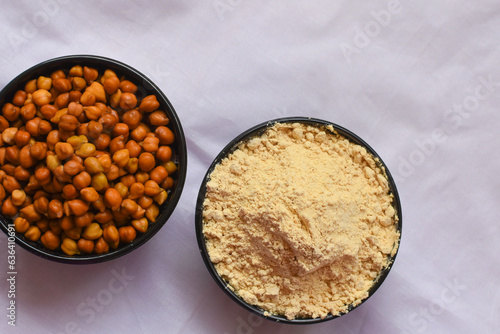 Sattu cha Peeth is a flour, mixture of roasted ground pulses and cereals. Traditional and nutritional food supplements from India. Served over white background. selective focus