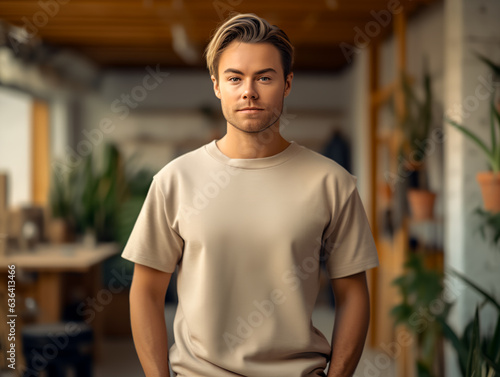 man standing while wearing white empty mock-up shirt, tshirt
