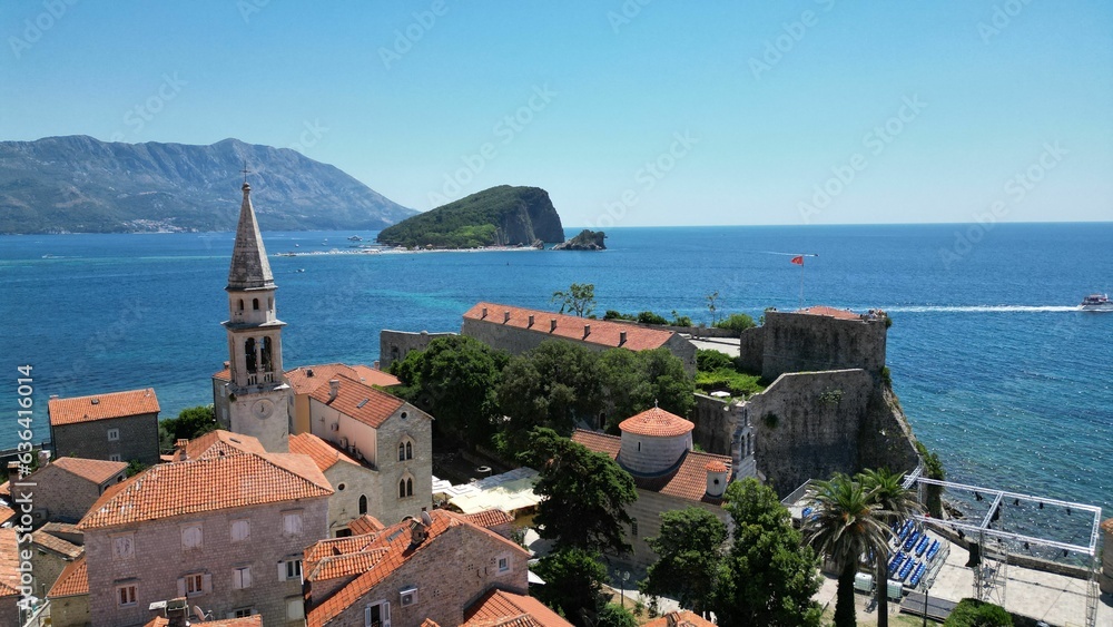 Aerial view of a coastal town of Budva with a variety of buildings in Montenegro