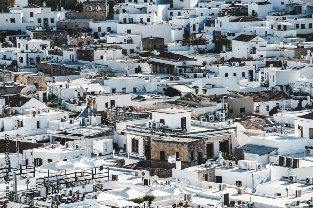 Scenic view of a picturesque city featuring white-washed buildings: Rhodos, Griechenland