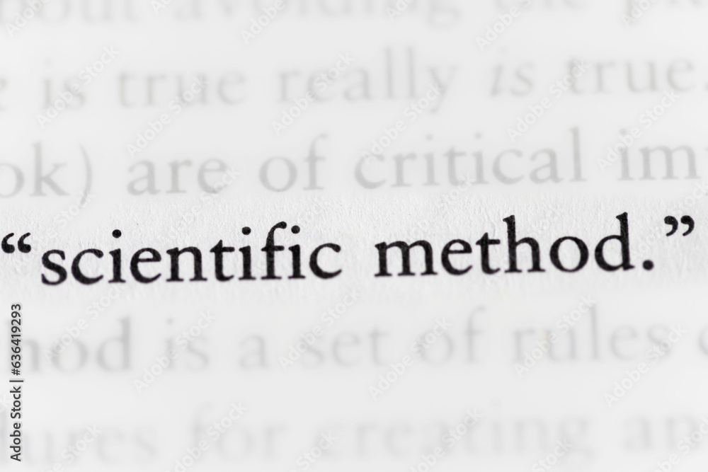 Fototapeta premium Close-up of a dictionary open to a page with the words 'Scientific Method'