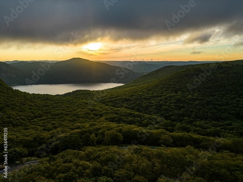 Aerial view over Storm King Mountain in upstate, New York during a golden sunrise