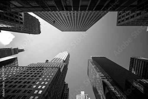 Stunning view of a cityscape of multiple high-rise buildings in grayscale photo