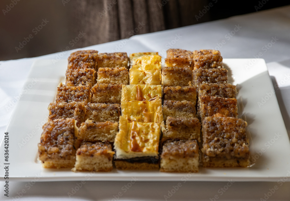 Various pieces of cake from Thuringia beautifully arranged in a pattern on cake plates Various pieces of cake from Thuringia beautifully arranged in a pattern on cake plates