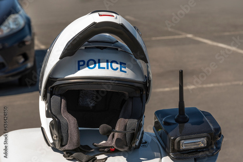 St Peter Port, Guernsey. Channel Islands. 11 June 2023.  Guernsey Police motorcycle  on stand and officers helmet and communications unit.communications unit. photo