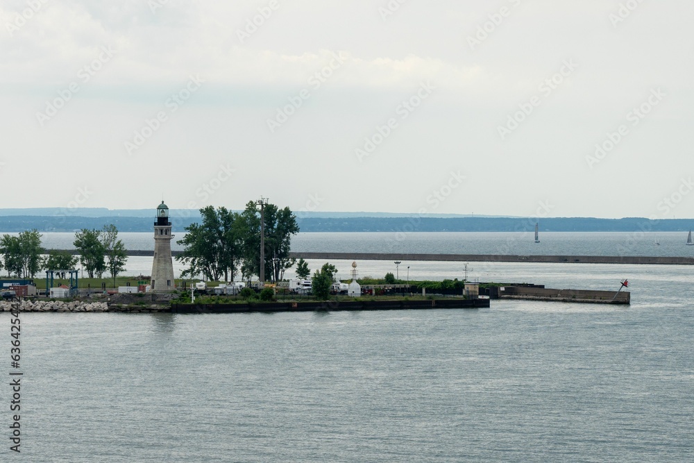 Picturesque view of the Buffalo Main Light lighthouse situated on an island Picturesque view of the Buffalo Main Light lighthouse situated on an island