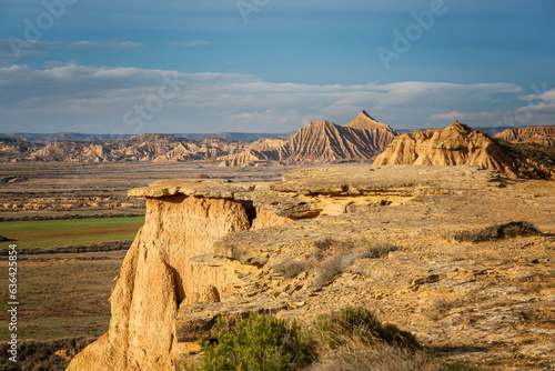 Majestic view of rough mountainous cliffs located in bad land terrain in Bardenas Reales in Navarra Spain