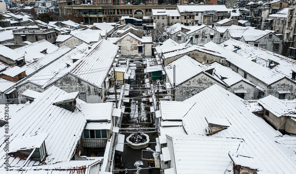 Aerial shot of buildings covered in snow in Wuhan, China. Aerial shot of buildings covered in snow in Wuhan, China.