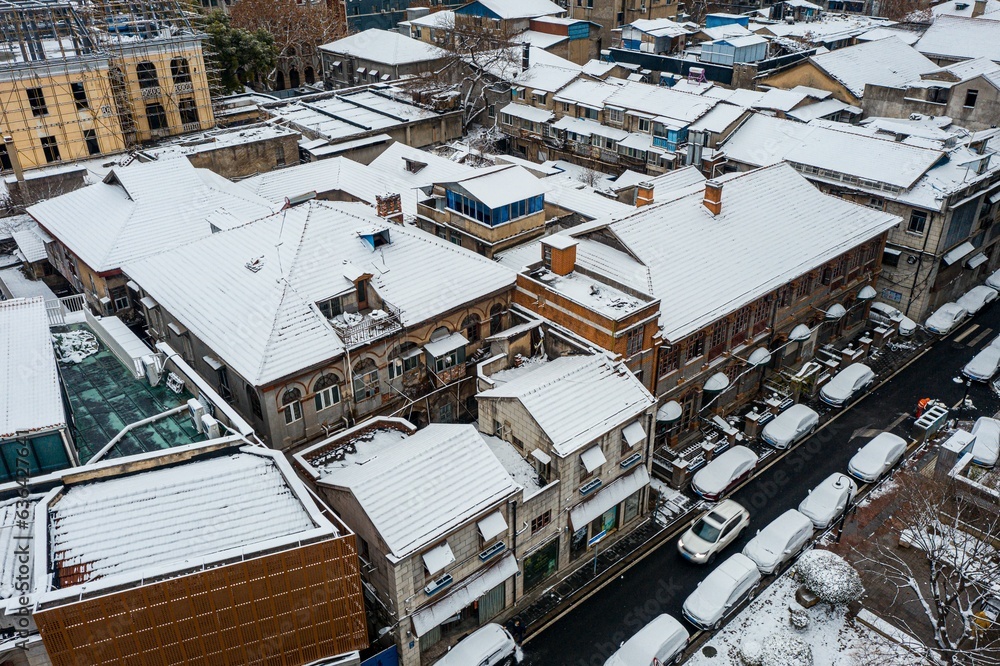 Aerial shot of buildings covered in snow in Wuhan, China.