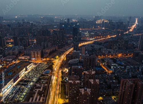 Aerial shot of the cityscape of Wuhan at nighttime  China.
