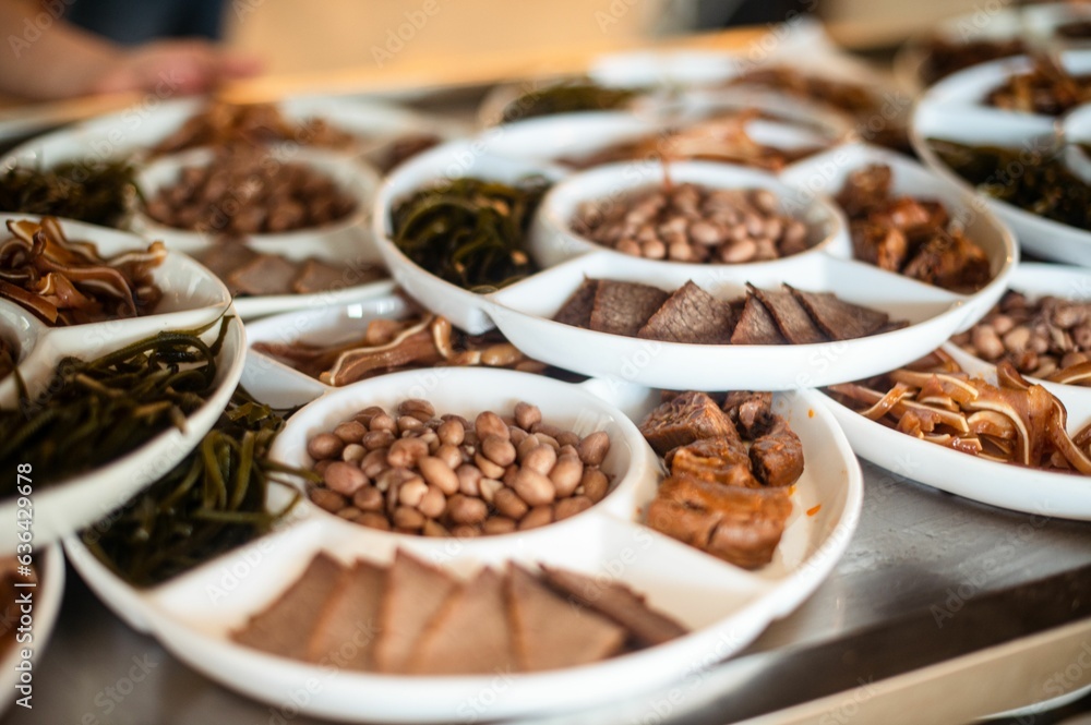 Tabletop display with various plates of food Tabletop display with various plates of food