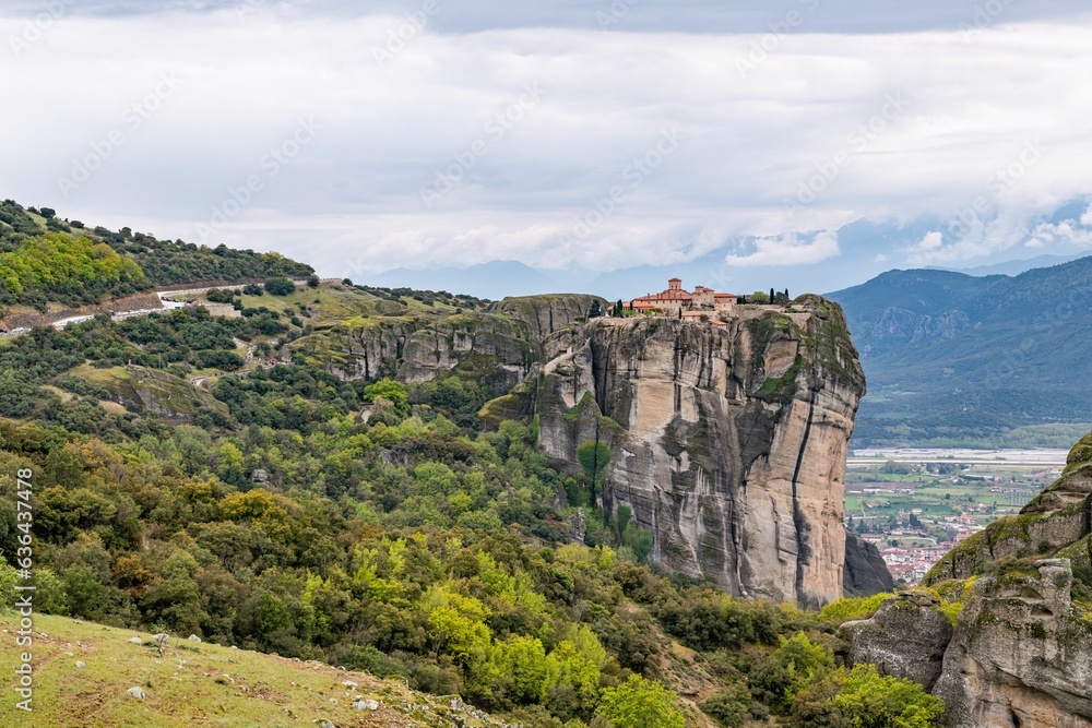 Scenic view of Meteora monasteries complex against the background of a cloudy sky. Kalabaka, Greece.
