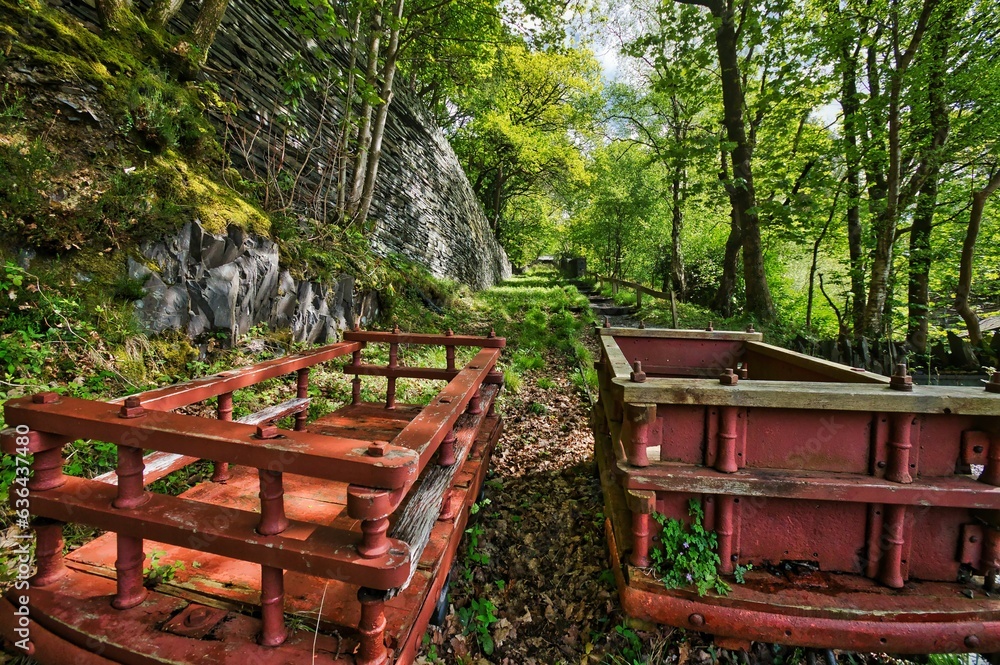 Two old red trolleys of an abandoned mine in Eryri National Park. Wales, UK.