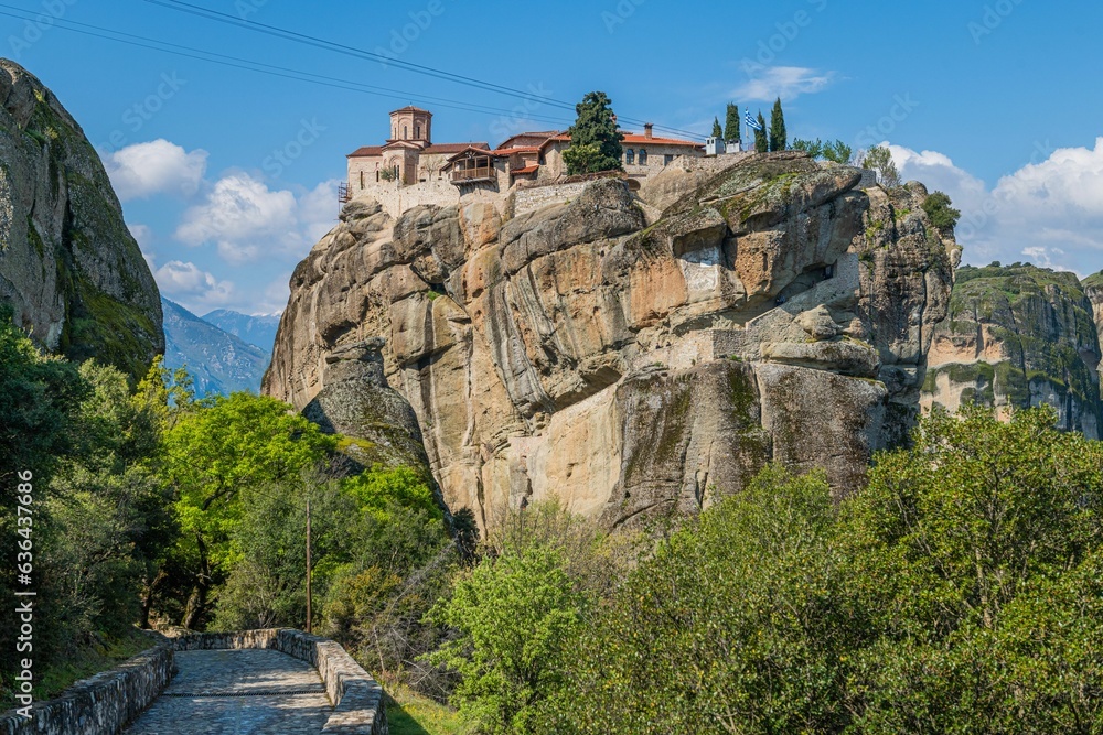 Picture shows an ancient Greek Orthodox monastery situated in a mountainous environment