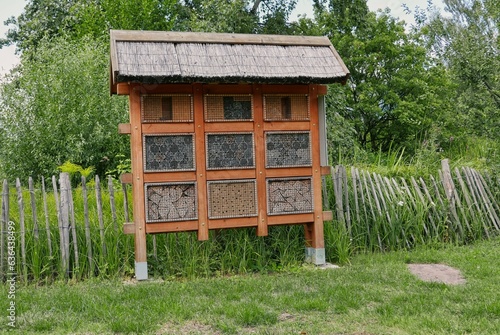 Wooden insect hotel in a park in Germany
