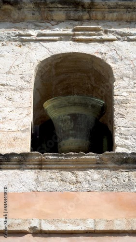  A bell in the bell tower turning and chiming