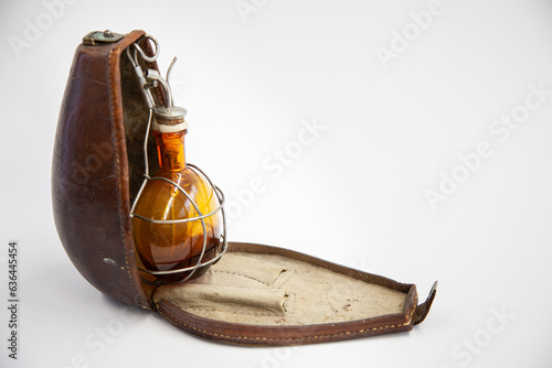 Antique anaesthesia kit. Leather case. Bottle for the anaesthetic ether or chloroform. Iron mask in which a cloth soaked in anaesthetic was placed and applied over the patient's nose and mouth. 